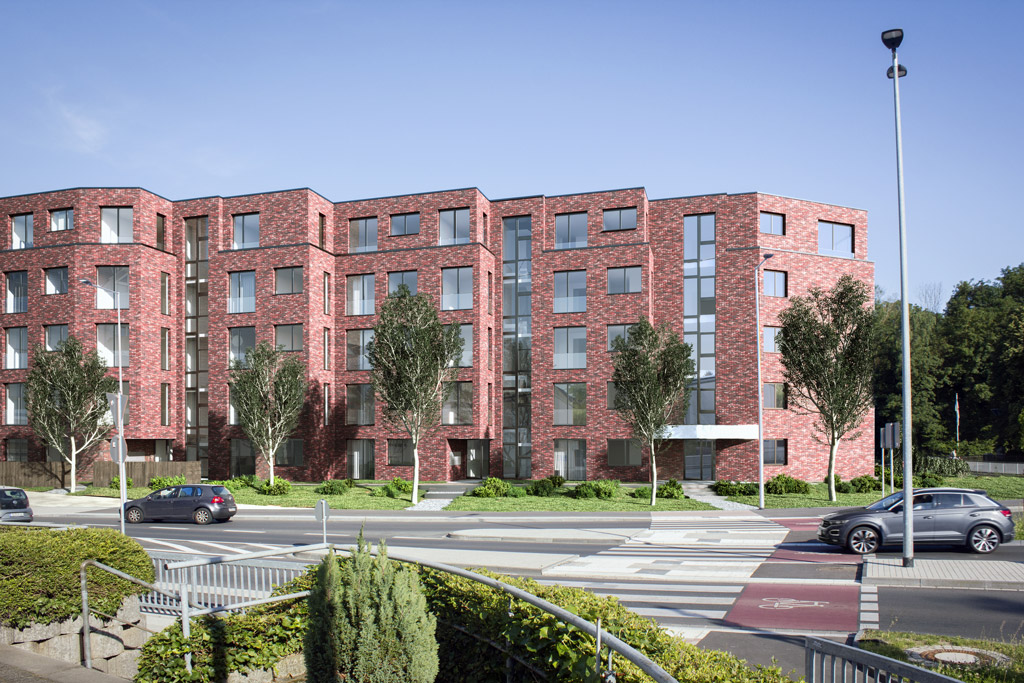 Straßenansicht Rennbaumstr. Leverkusen mit hochwertiger Klinkerfassade in warmen Rottönen, in zeitlosem & eleganten Verbund